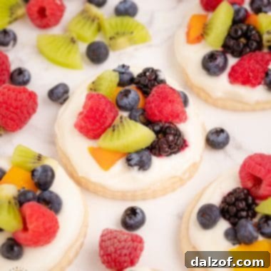 Fruit Pizza Cookies, a delightful dessert featuring a sugar cookie base, sweet cream, and fresh fruit