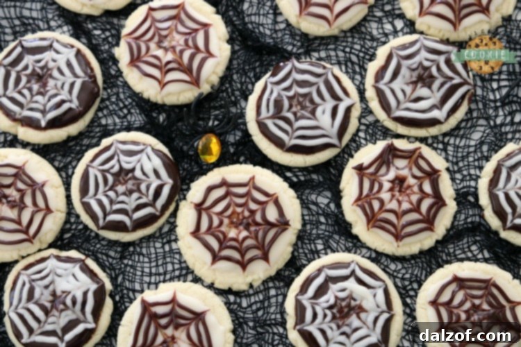 Close-up of freshly baked Halloween Cobweb Cookies with detailed decoration