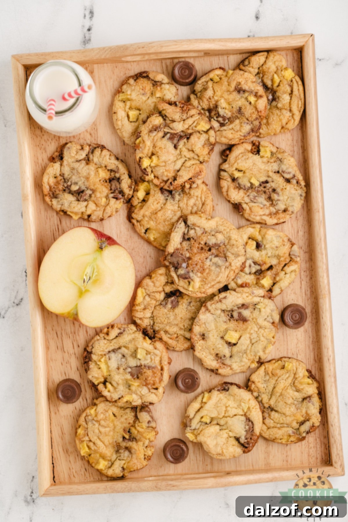 Several soft and chewy Caramel Apple Cookies made with cake mix on a cooling rack.