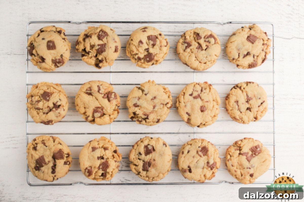 A stack of perfectly baked Reese's Peanut Butter Banana Cookies.