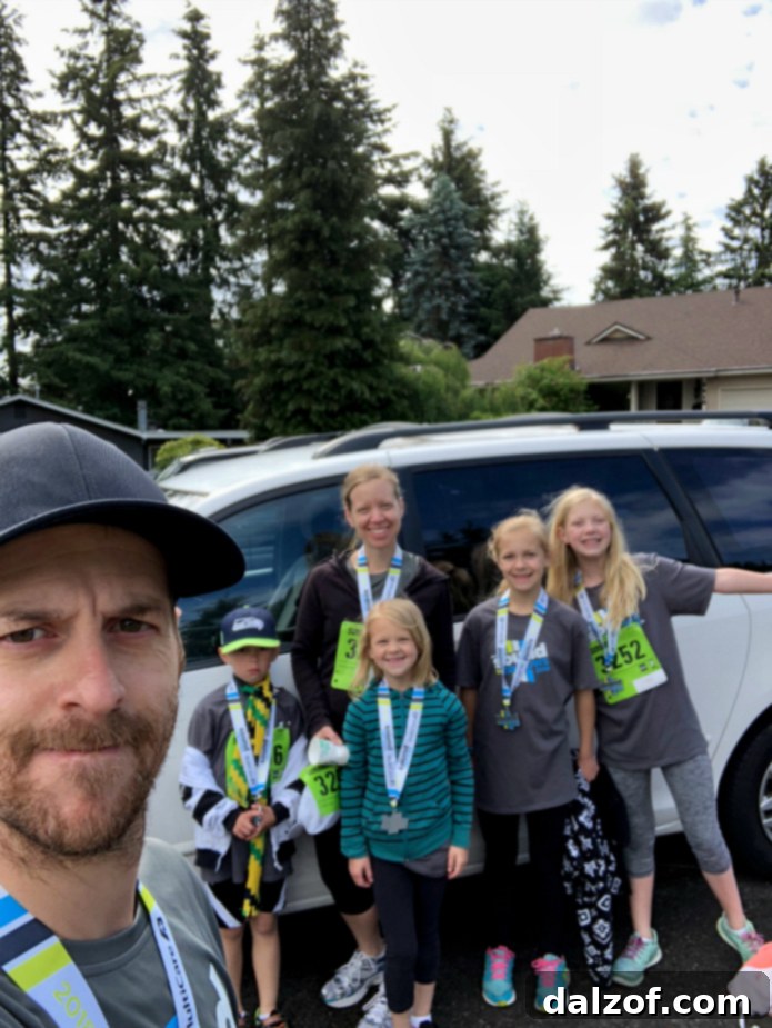 Family photo after completing a 5K race, showing happy but tired faces.