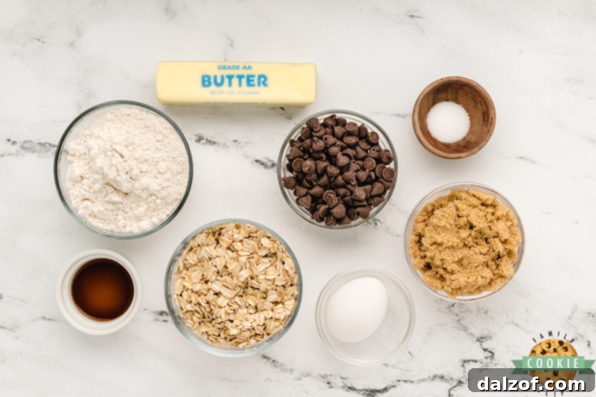 Essential ingredients for crafting perfect Microwave Oatmeal Chocolate Chip Cookies laid out on a table.