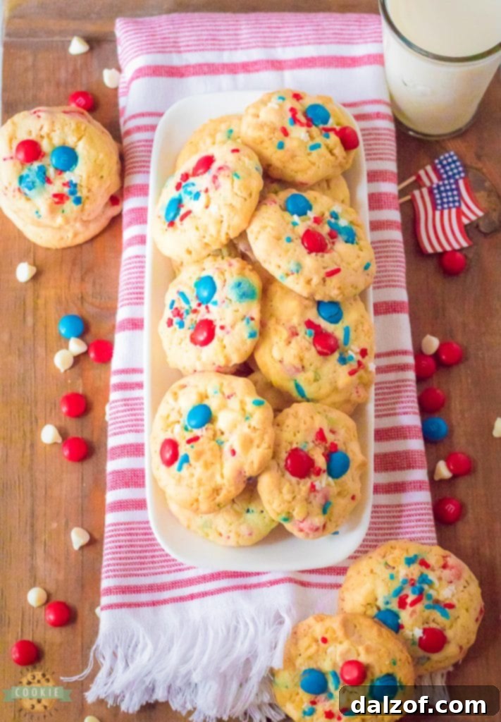 Assortment of patriotic red, white, and blue cookies, perfect for a Fourth of July celebration.