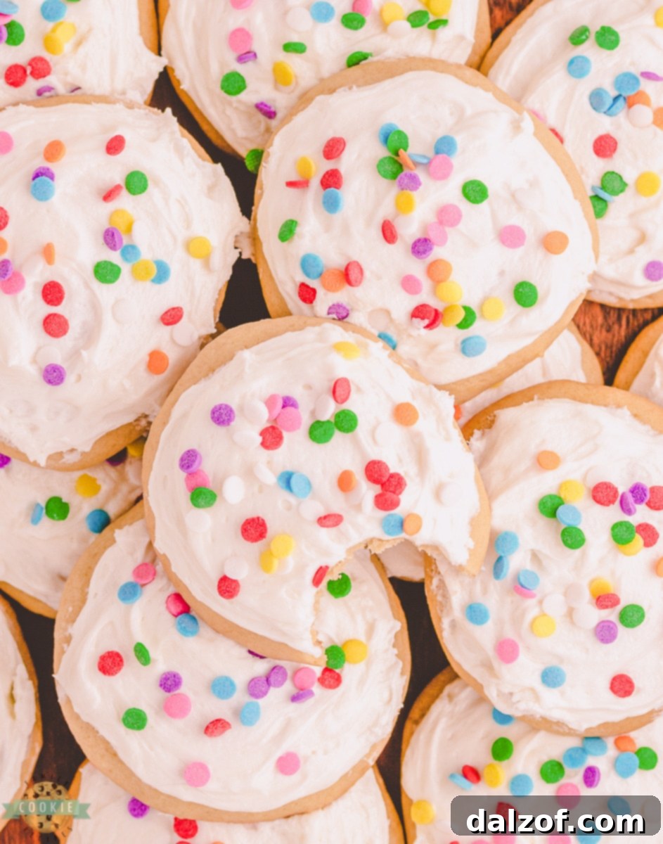 Soft and pillowy buttermilk sugar cookies with white frosting.