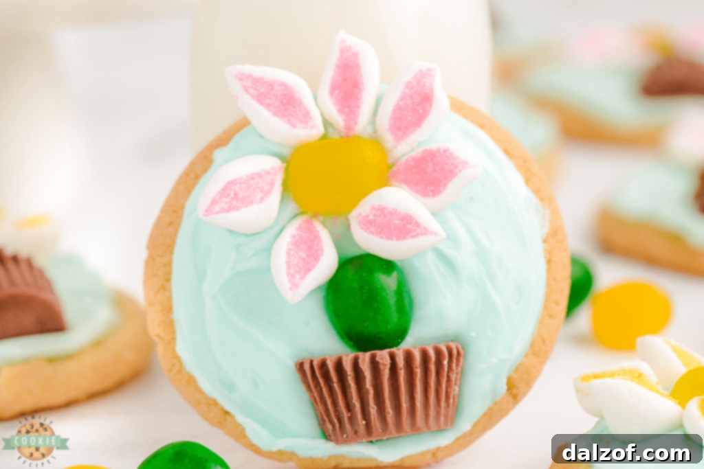 Charming marshmallow flower cookies in chocolate pots with jelly bean stems.