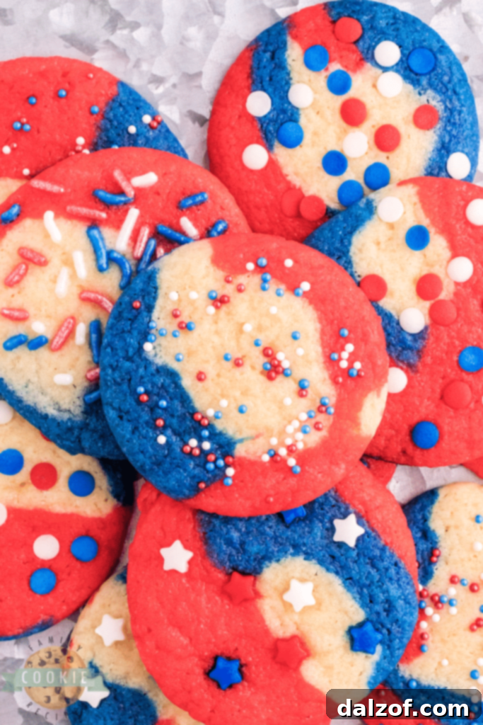 Patriotic swirled sugar cookies with red, white, and blue colors.