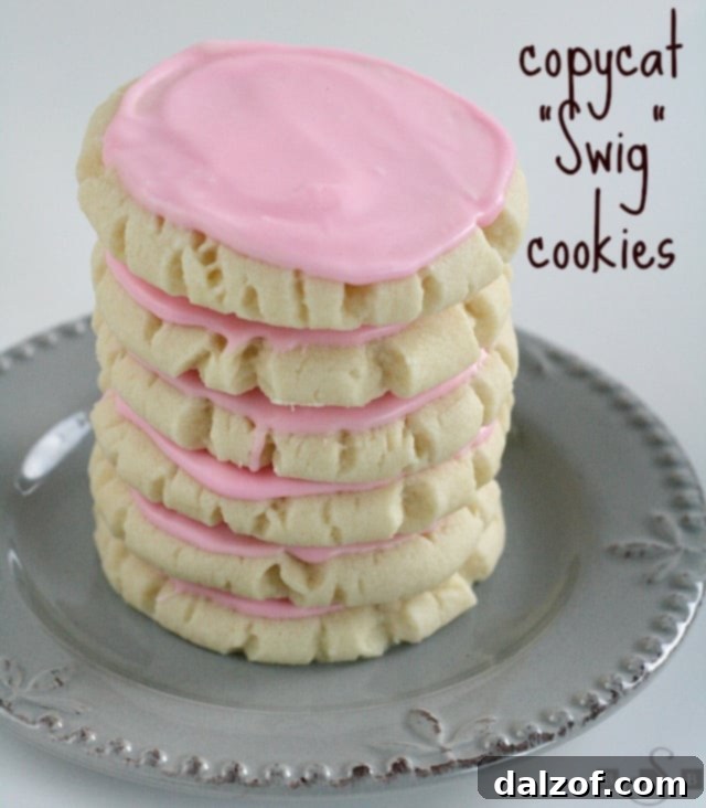 Copycat Swig Sugar Cookies with a pink frosting.