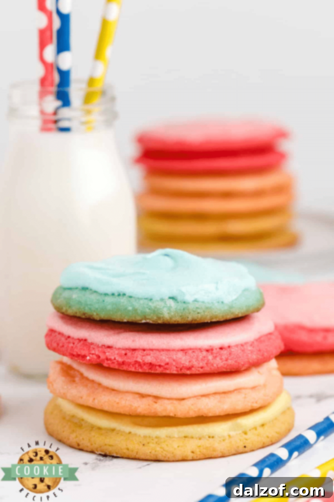 Assortment of vibrant Jello Sugar Cookies with various frostings.