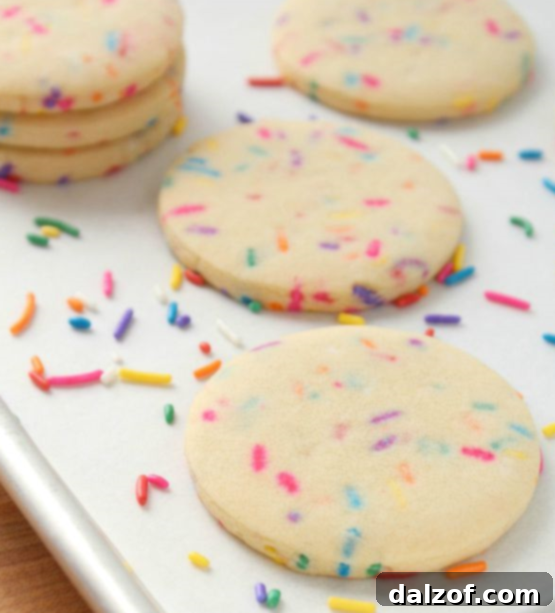 Rainbow Funfetti Cutout Cookies with colorful sprinkles.