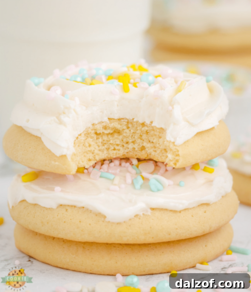 A stack of perfectly soft and thick sugar cookies, ready for frosting.
