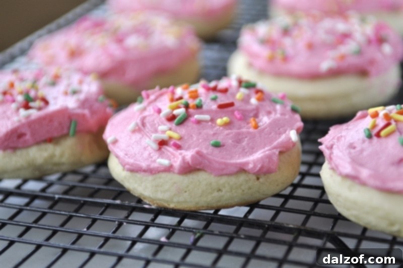 Copycat Lofthouse Sugar Cookies with thick pink frosting.