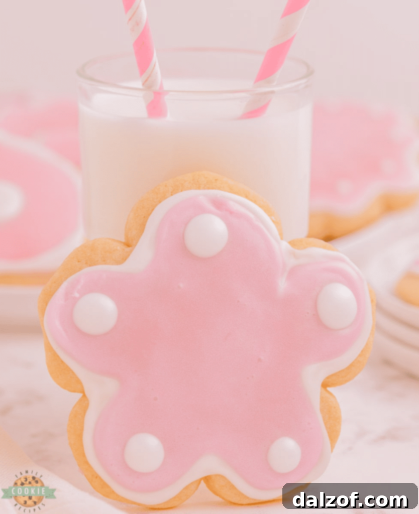 Beautifully decorated lemon cut out sugar cookies in pastel colors.