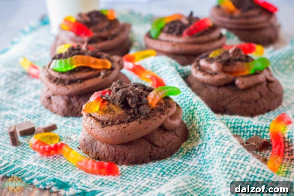 Making giant Dirt Cake Cookies with dough balls on a baking sheet