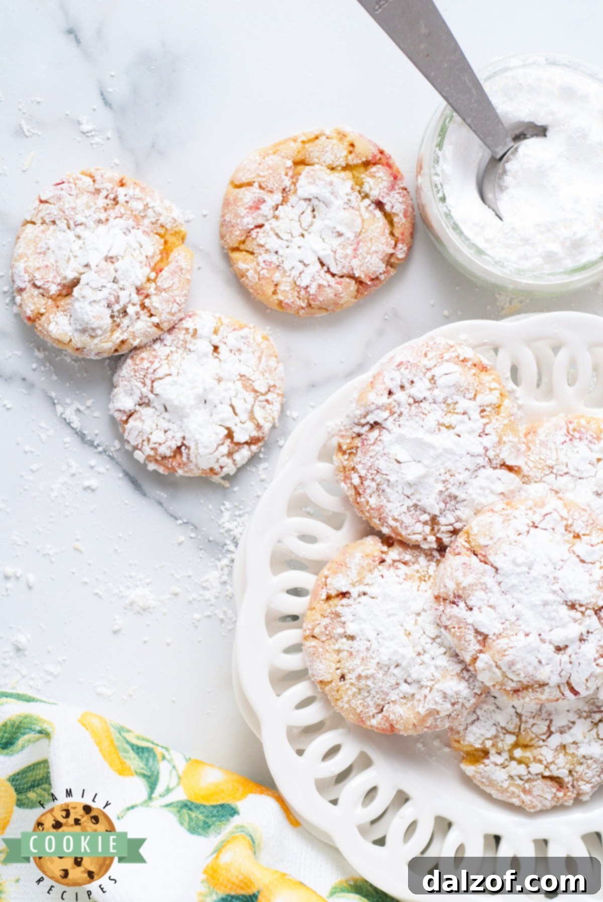Lemon Cake Mix Cookies featuring visible specks of freeze-dried strawberries, highlighting the main flavors.