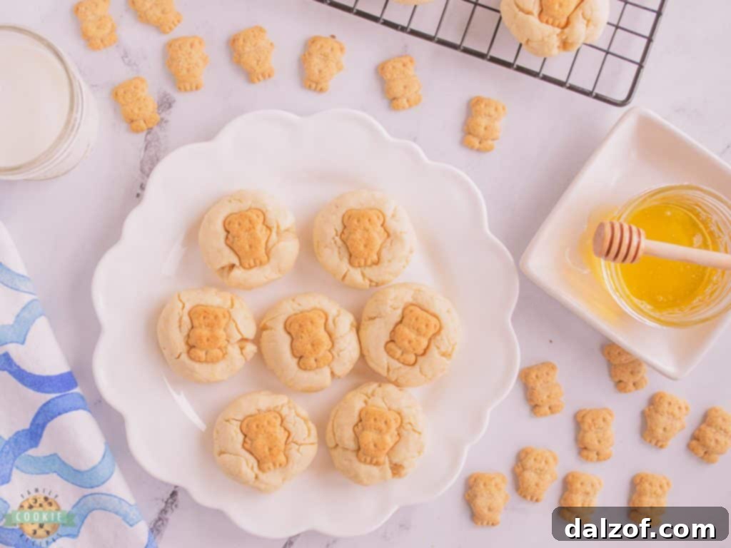 Freshly baked honey butter bear cookies on a cooling rack