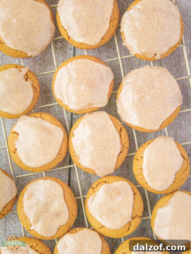 ginger molasses cookies on a cooling rack