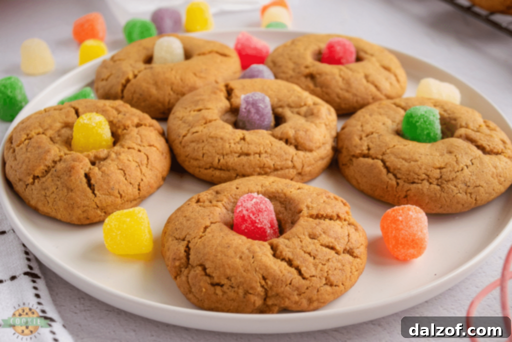 Colorful Gumdrop Gingerbread Cookies, studded with vibrant gumdrops for a playful touch.