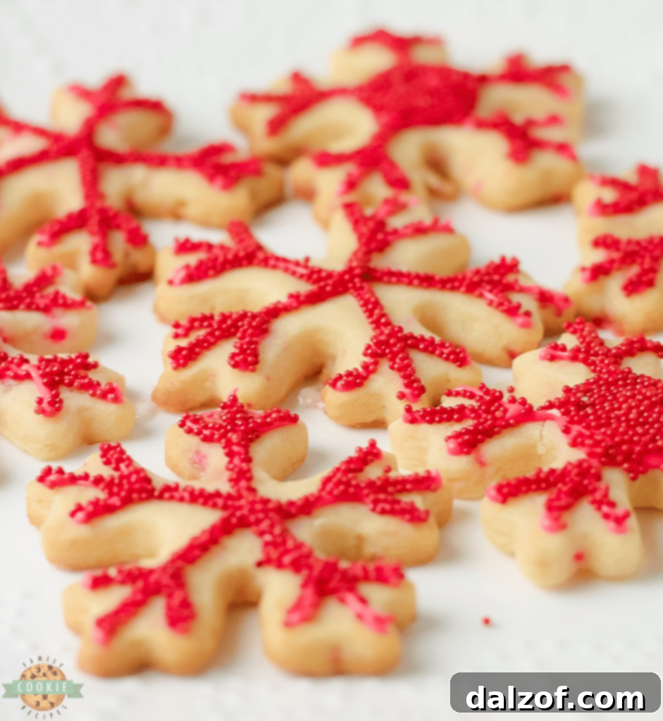 Festive Peppermint Cutout Cookies, decorated with icing and crushed candy canes for Christmas.