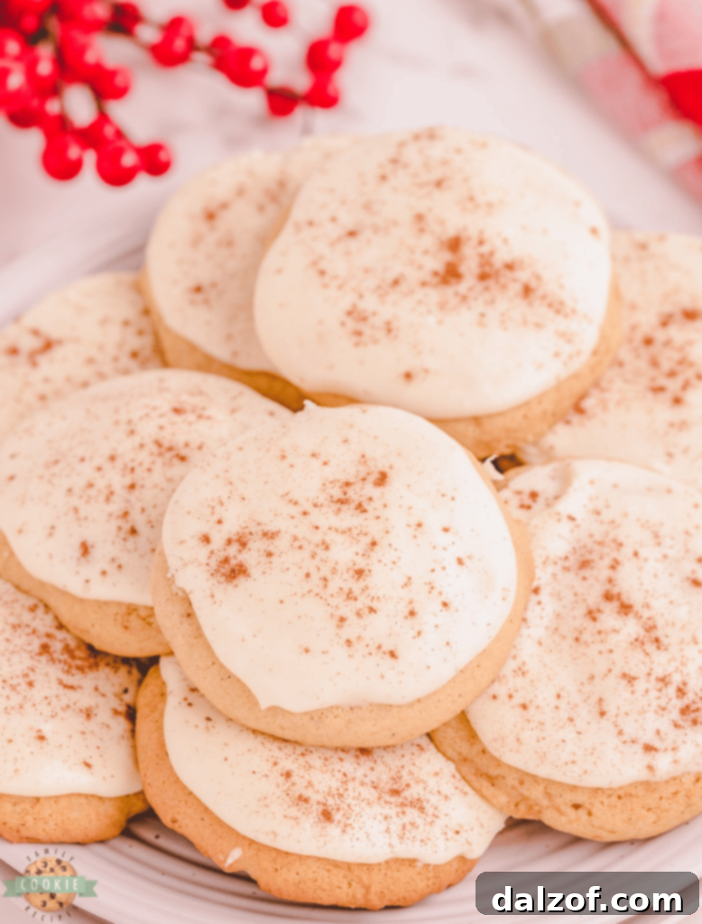 Festive Frosted Eggnog Cookies, topped with a creamy eggnog buttercream.
