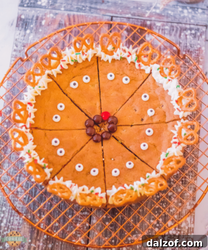 A festive Reindeer Cookie Cake, decorated to resemble a cute reindeer.