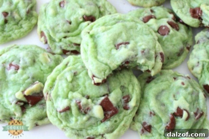 Mint Chocolate Chip Cookies made by adding mint extract & chocolate chips to a delicious pudding cookie dough. This chocolate chip cookie recipe is perfect for those who love mint chip ice cream. Our Mint Chocolate Chip Cookies are great for holiday baking!