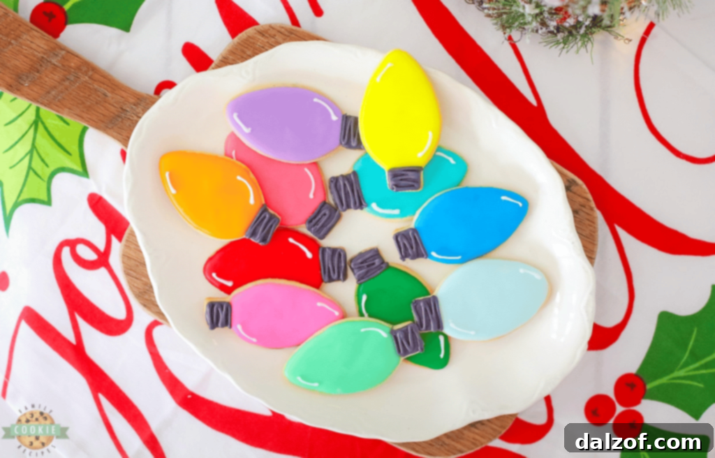 Bright and colorful Christmas Light Cut-out Cookies, frosted to look like holiday lights.
