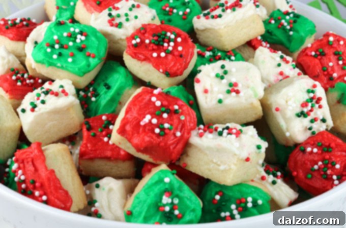 Bite-sized Christmas Sugar Cookie Bites with buttercream frosting, a smaller version of the classic.