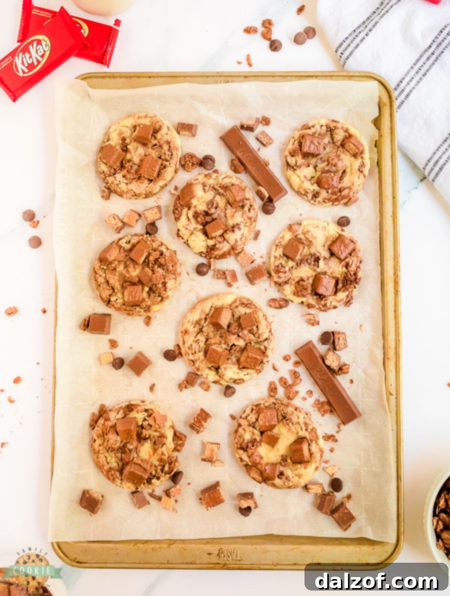 Kit Kats baked into cookies on a tray