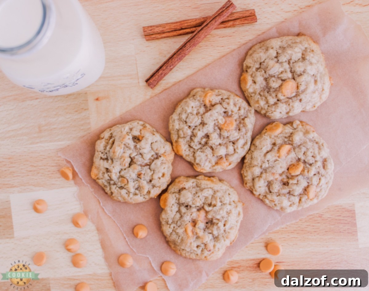 Close-up of golden brown oatmeal butterscotch cookies with visible butterscotch chips and oats