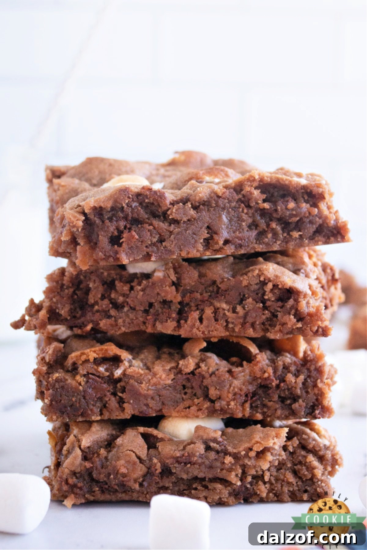 Gooey Swiss Miss Chocolate Chip Cookie Bars loaded with marshmallows and chocolate chips, tasting just like hot cocoa.