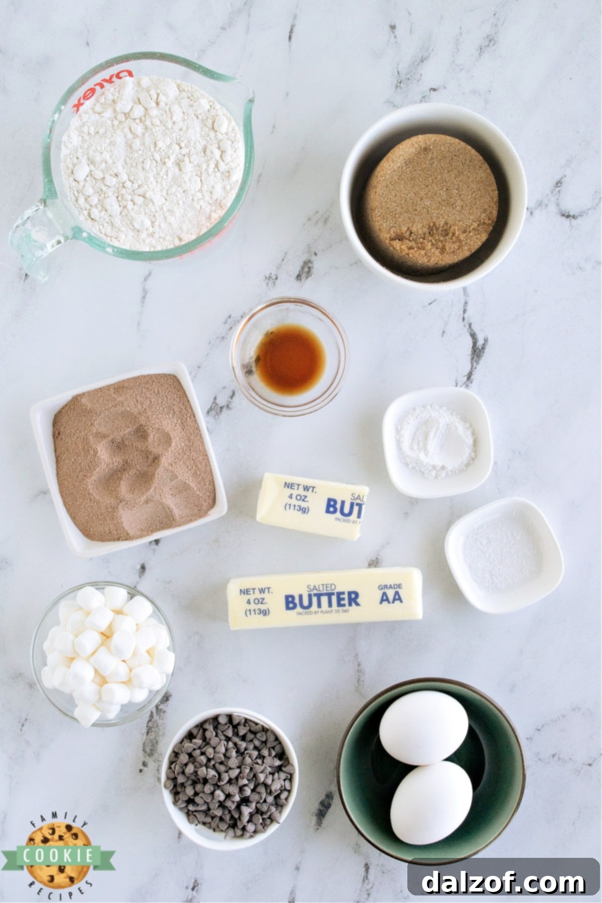 A flat lay showing all the essential ingredients for making Swiss Miss Chocolate Chip Cookie Bars.