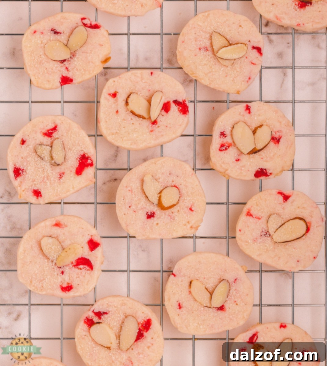 coconut almond cherry shortbread on a cooling rack