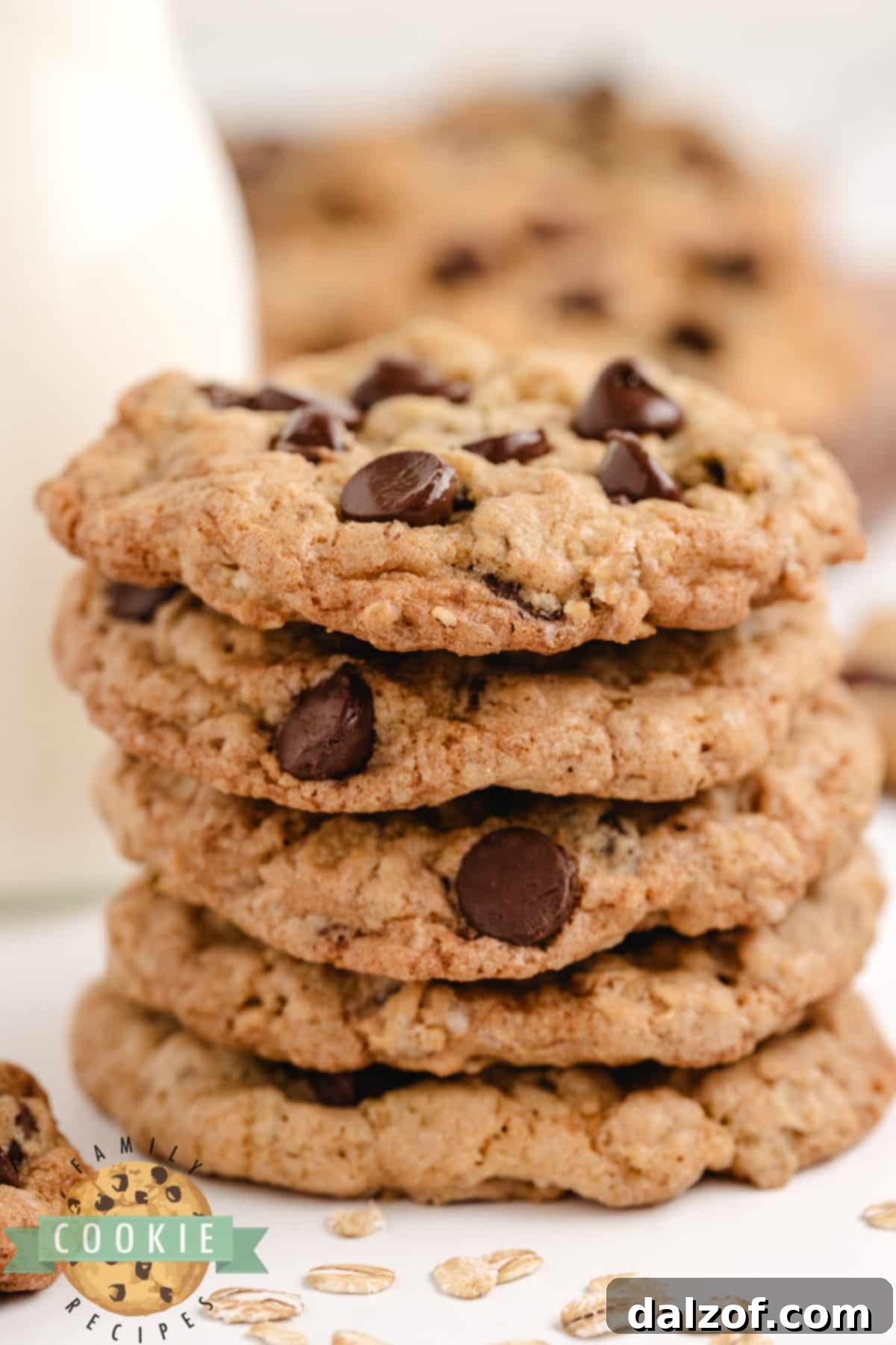 A stack of golden brown Oatmeal Chocolate Chip Cookies ready to be enjoyed.