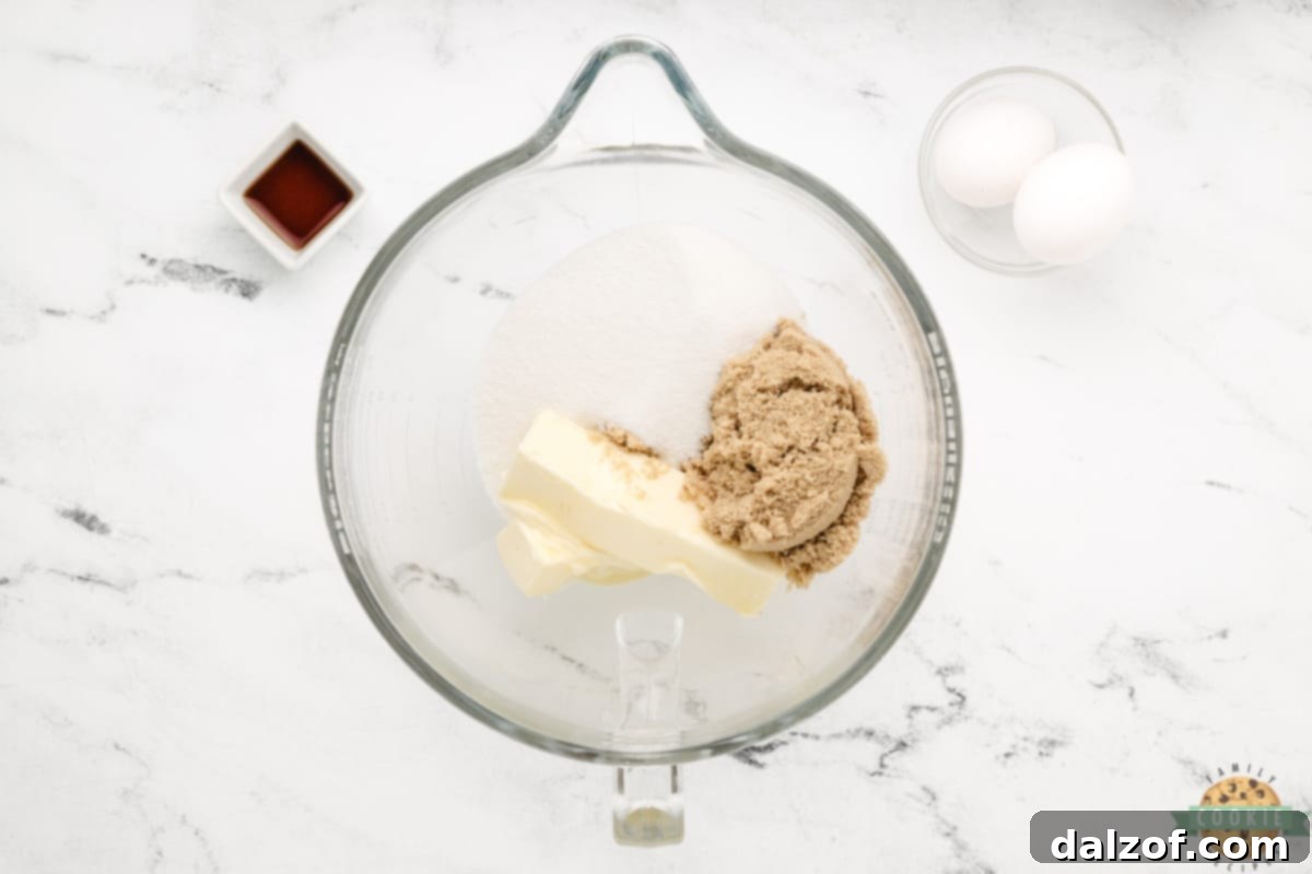 Creaming butter and sugars for cookie dough.