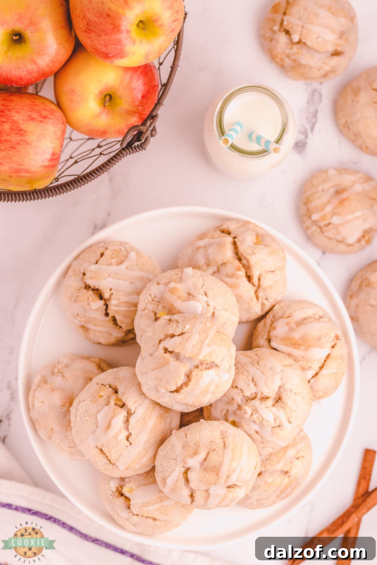 A plateful of freshly baked Apple Cinnamon Scookies with a delicate vanilla glaze.