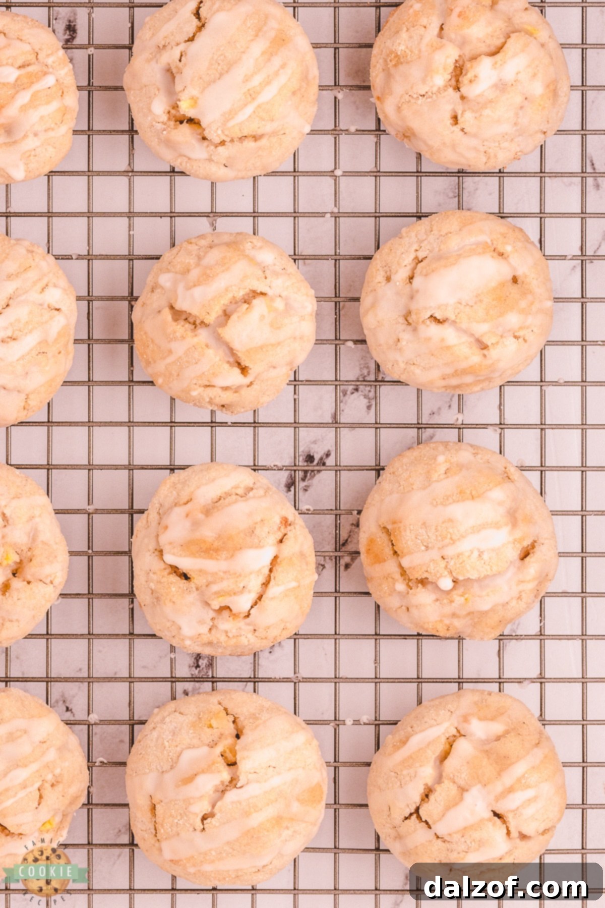 Warm apple scookies cooling on a wire rack.