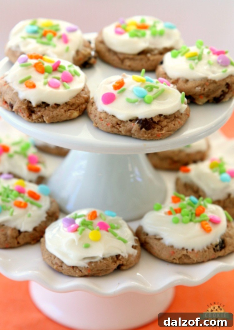 Carrot Cake Cookies are soft and chewy, flavorful carrot cake cookies made with a cake mix! Topped with a creamy cheesecake frosting, these carrot cake cookies are perfect for Easter! 