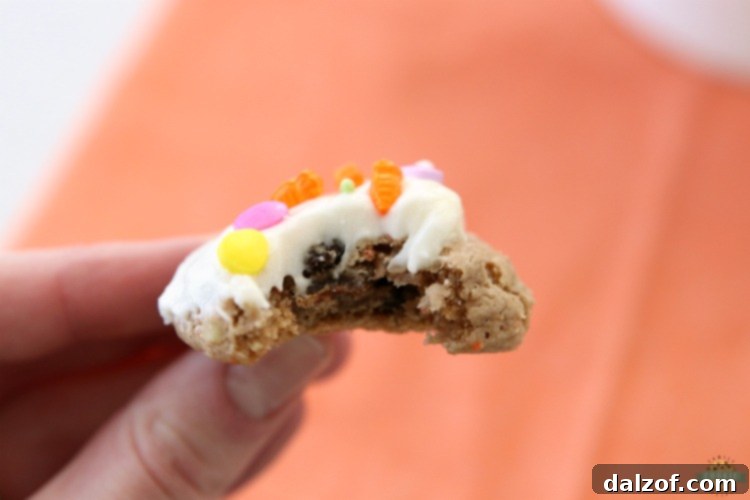 Carrot Cake Cookies are soft and chewy, flavorful carrot cake cookies made with a cake mix! Topped with a creamy cheesecake frosting, these carrot cake cookies are perfect for Easter! 