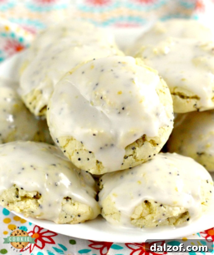 Zesty Lemon Poppy Seed Delights 2 Freshly baked Lemon Poppyseed Cookies with a vibrant lemon glaze, perfect for spring gatherings