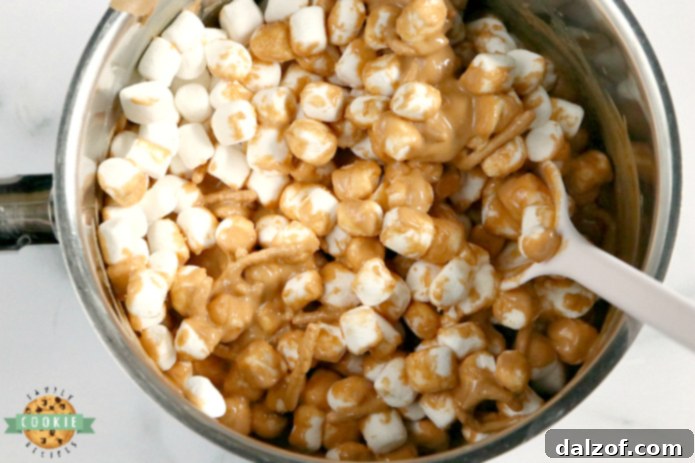 Marshmallow Peanut Butter No Bake Cookies are made with only 4 ingredients - marshmallows, peanut butter, butterscotch chips and chow mein noodles!