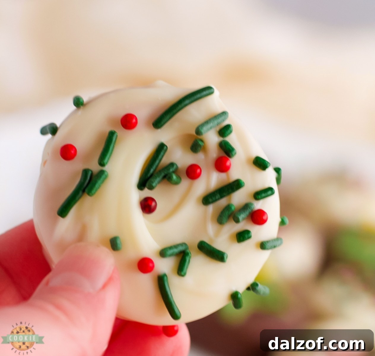 White chocolate covered Ritz cracker cookies with holiday sprinkles