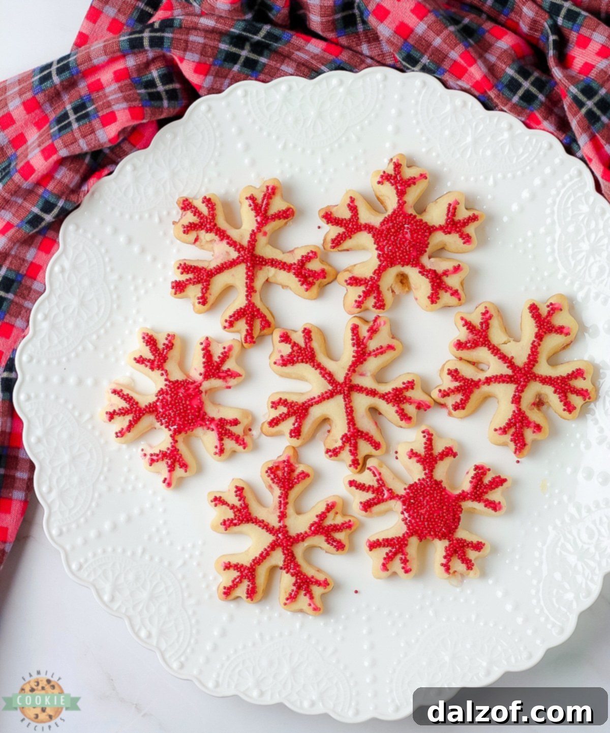 A charming plate laden with freshly baked peppermint cutout cookies