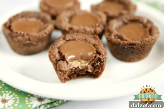 Reese's Chocolate Cookie Cups are bite-sized treats made with a delicious chocolate cookie base that is filled with a miniature Reese's Peanut Butter Cup! The perfect chocolate and peanut butter dessert!