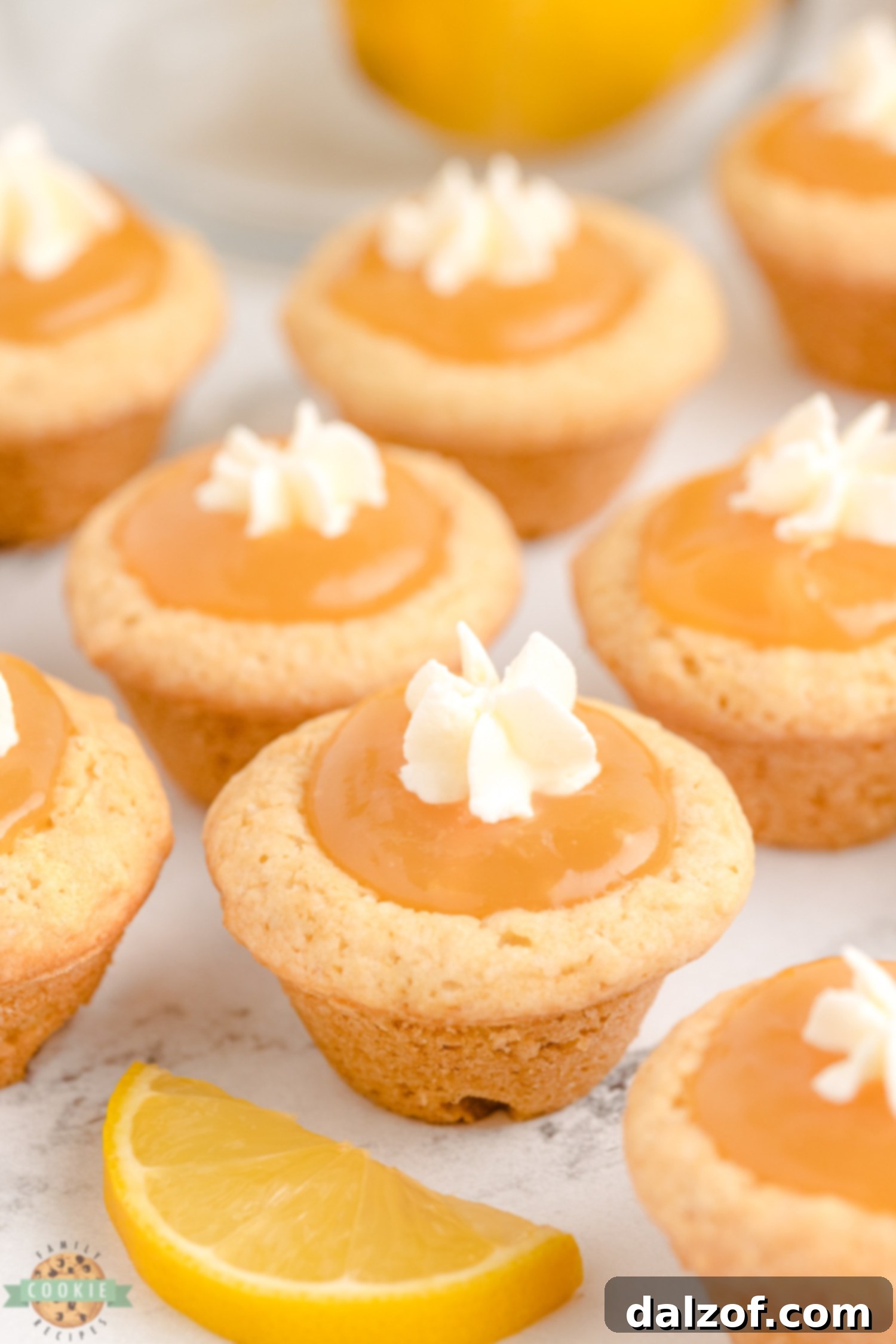 Lemon curd cookies garnished with elegant whipped cream stars