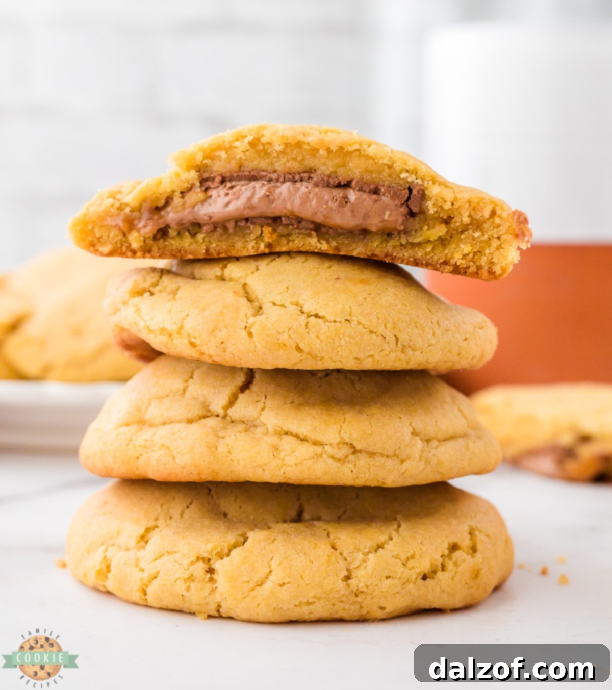 stack of Milky Way cookies, showcasing their golden-brown edges and soft centers