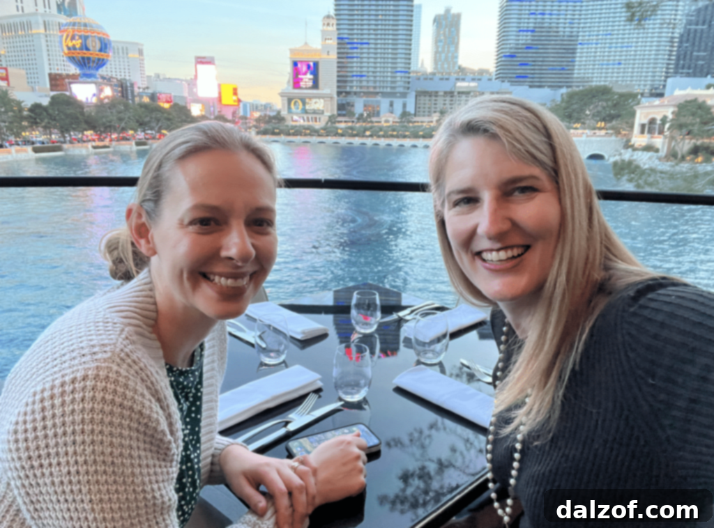 Two friends enjoying a meal at a restaurant in Las Vegas.