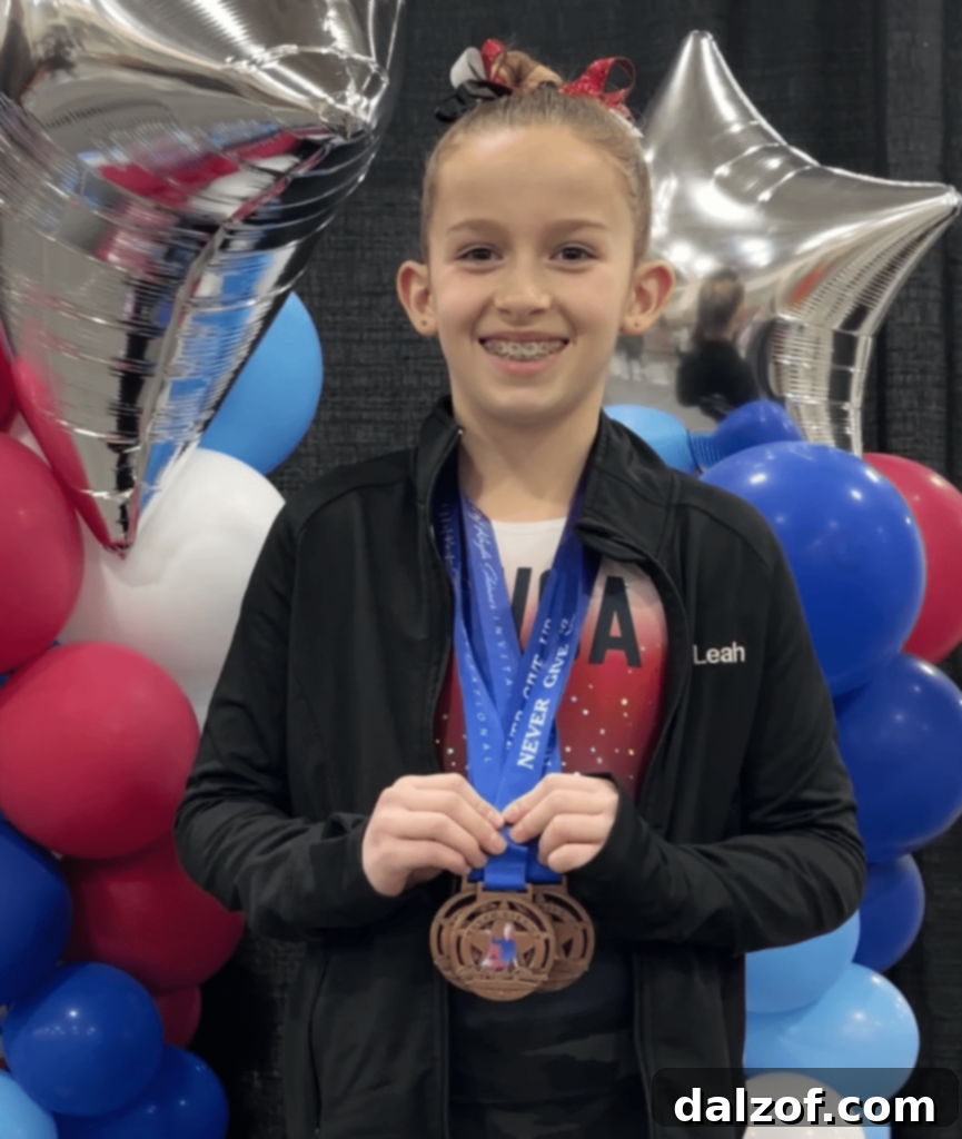 A young gymnast gracefully performing a routine on a balance beam, demonstrating strength and focus.