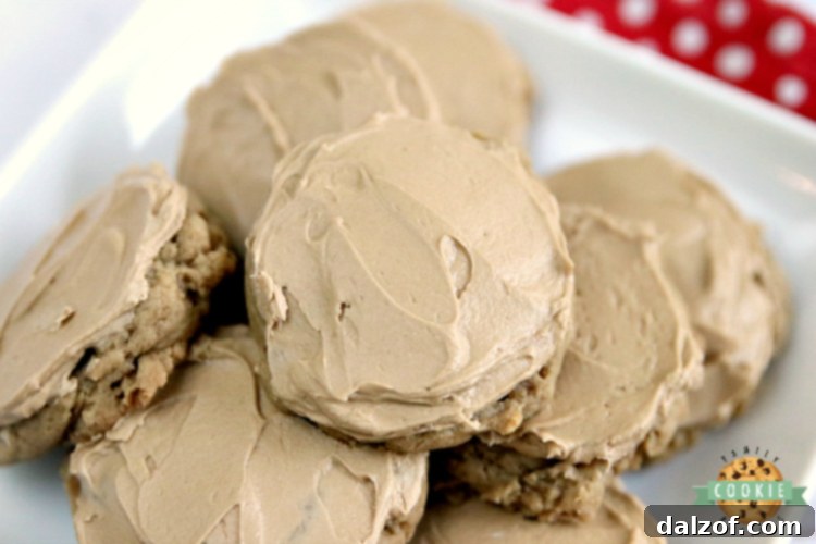 A beautifully arranged serving of Root Beer Cookies, soft and delicious, featuring root beer extract in the cookie base and a delightful buttercream frosting.