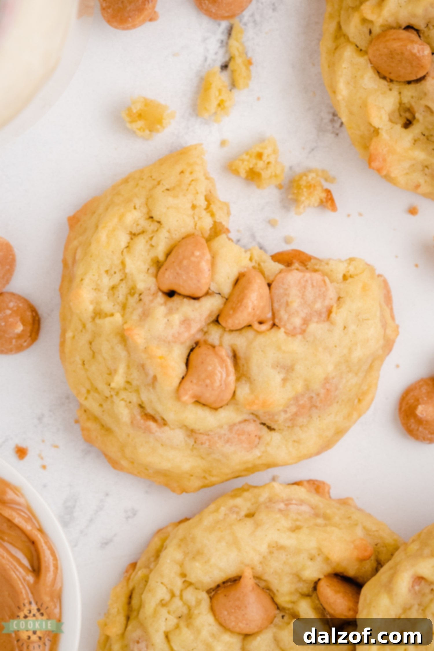 A bite taken out of a peanut butter banana cookie, showing its soft interior