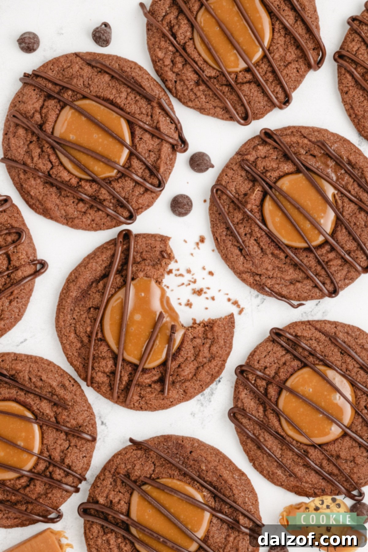 Freshly baked Caramel Brownie Thumbprint Cookies cooling on a rack